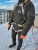 fallskyddssele expert pro 200 på snöigt tak med närbild framifrån